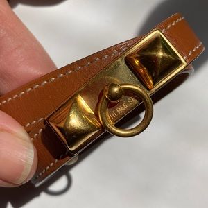 Hermés Double Tour Bracelet in Gold
x Brown Rivale Stud Bracelet